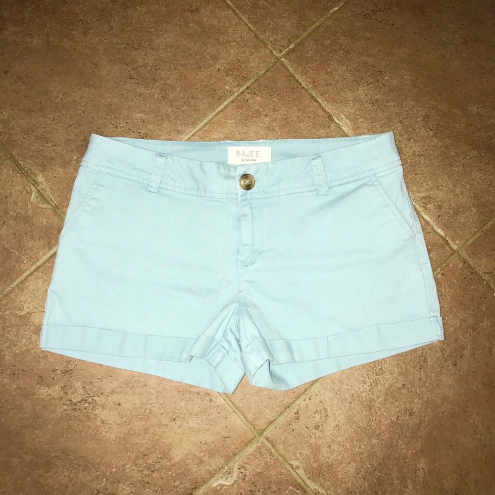 Light blue shorts.